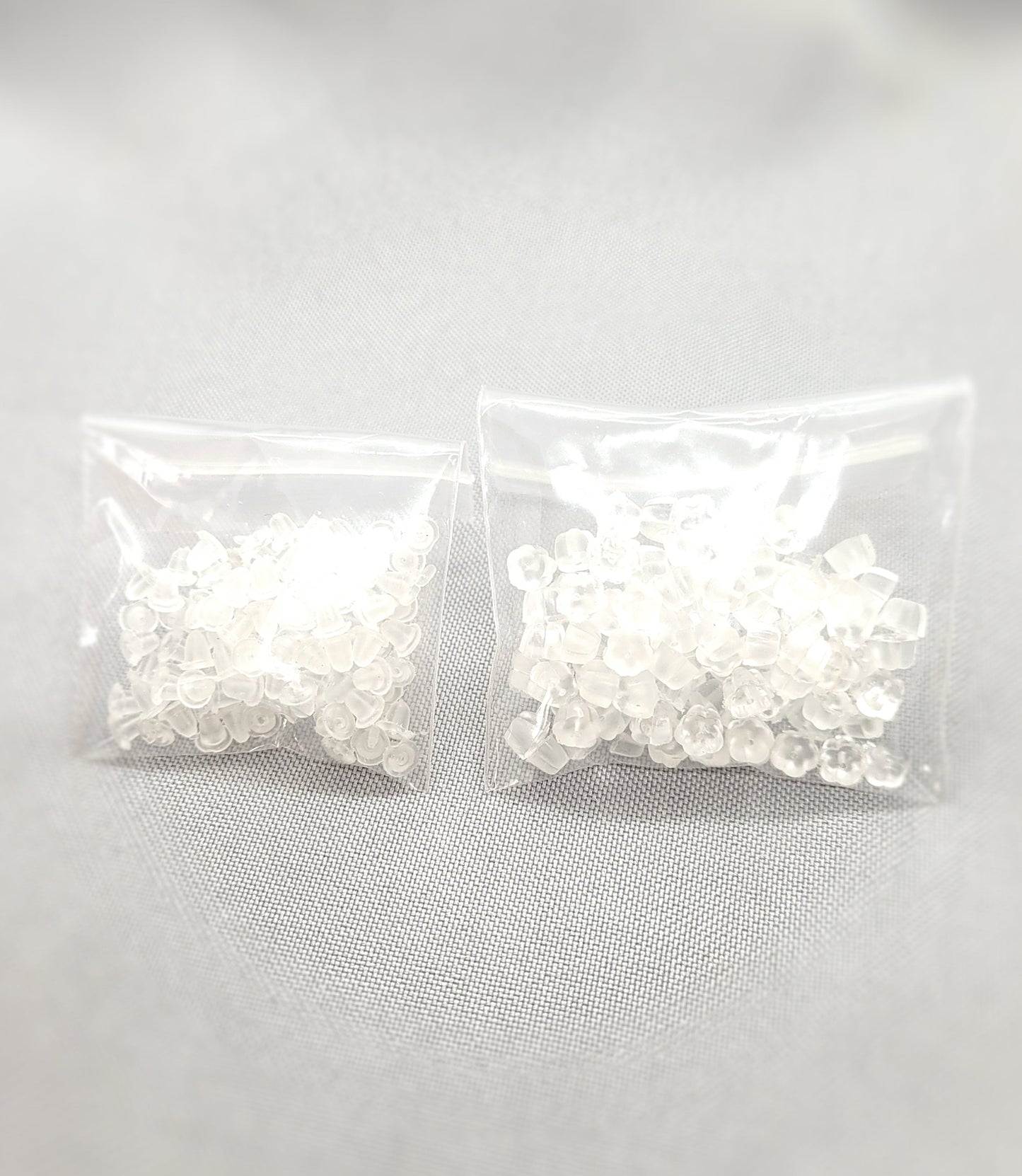 Silicone Earring Backs, Ear Nuts, Round or Flower shape, 100 pcs, Translucent White, Flexible Silicone, Hole 0.7mm, See sizes in description