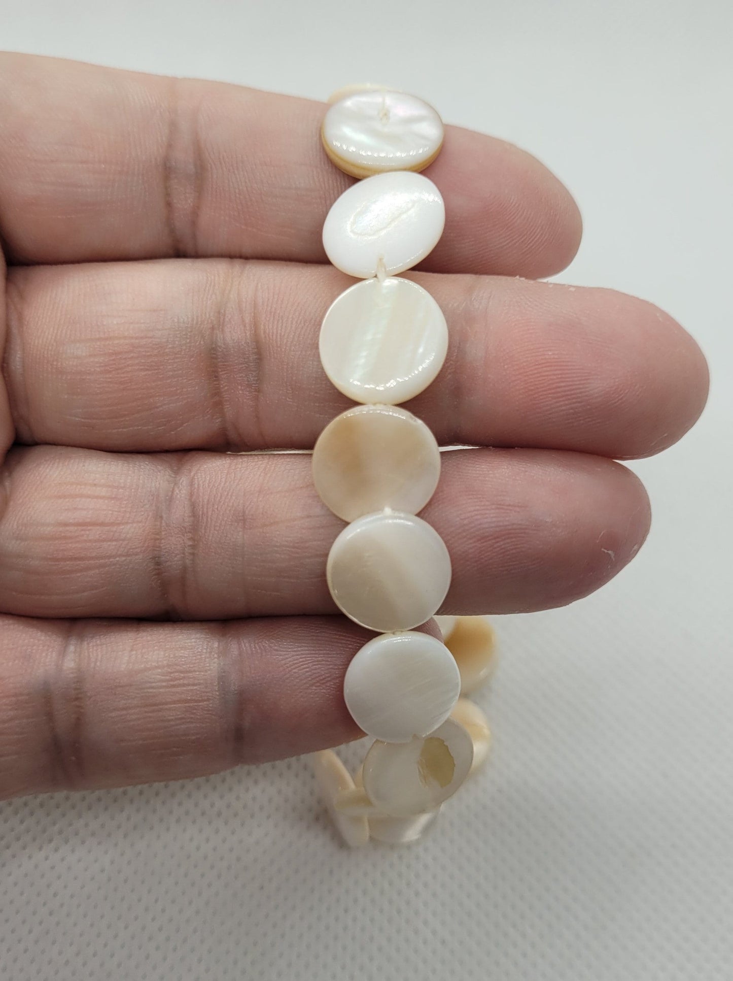 Natural Mother of Pearl Shell Spacer Discs, 1 strand, Polished, 12-13mm diameter, 2-4mm thick, Hole ~1mm, about 30 per strand