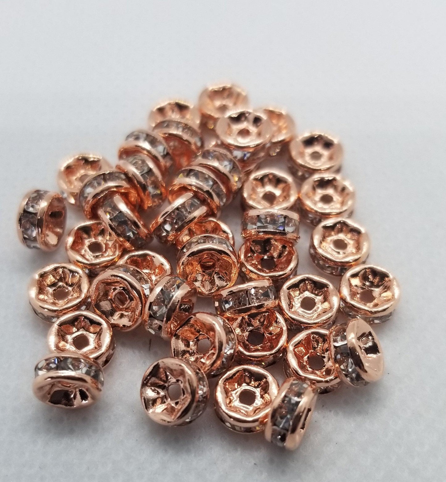 10 pieces Rose Gold Rhinestone Spacers, Grade AAA, Straight Flange, Nickel Free, Rondelle, Clear Crystal, 6x3mm, Hole: 1mm