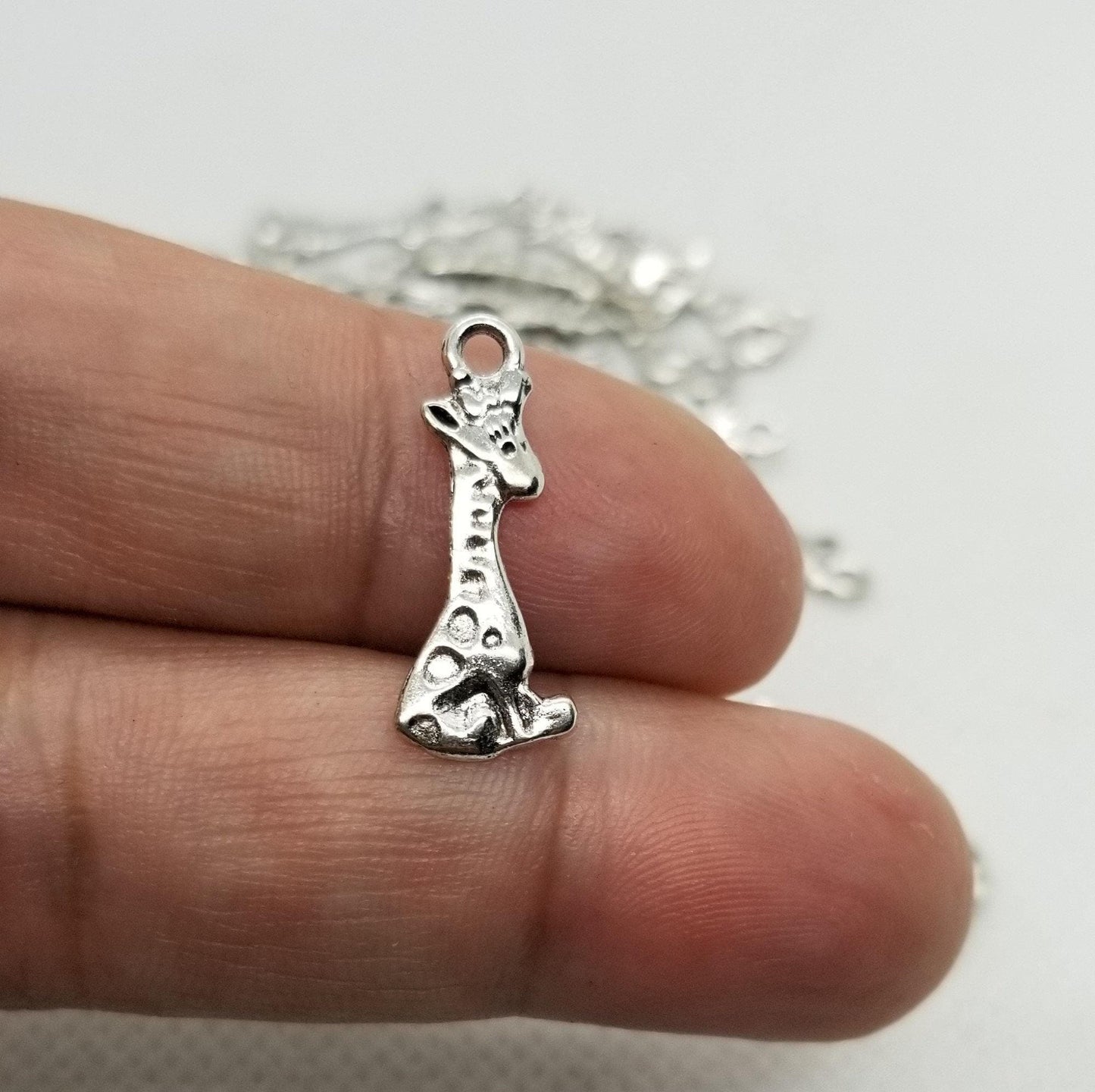 10 pieces Silver Giraffe Charms, Adorable Pendants, Cadmium & Lead Free, Sitting Giraffe, Antique Silver, 22x8x1mm, Hole 2mm
