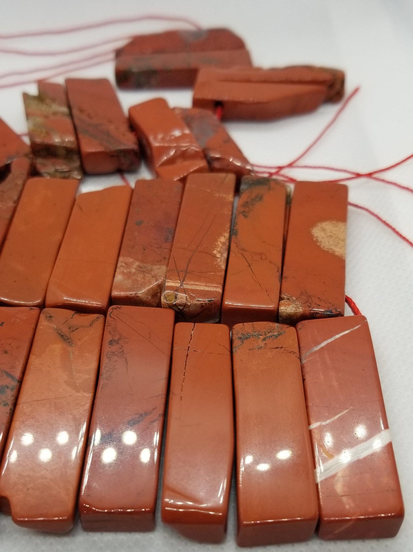 4 pieces Natural Red Jasper Points, Top Drilled, Rough Polished, Rectangle, 20~65x7~15x6~10mm, Hole 2mm