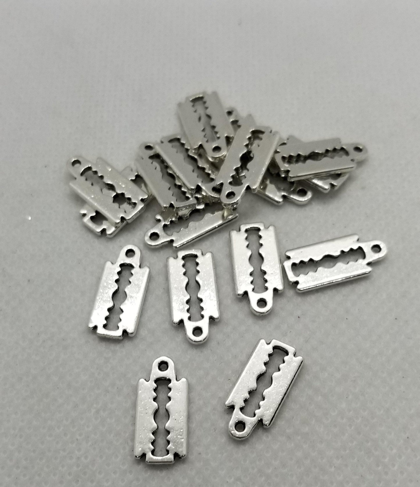 10 pieces Silver Razor Blade Pendant Charm, Tibetan Style, Cadmium, Lead Free, 16x7.5x1mm, Hole 1mm