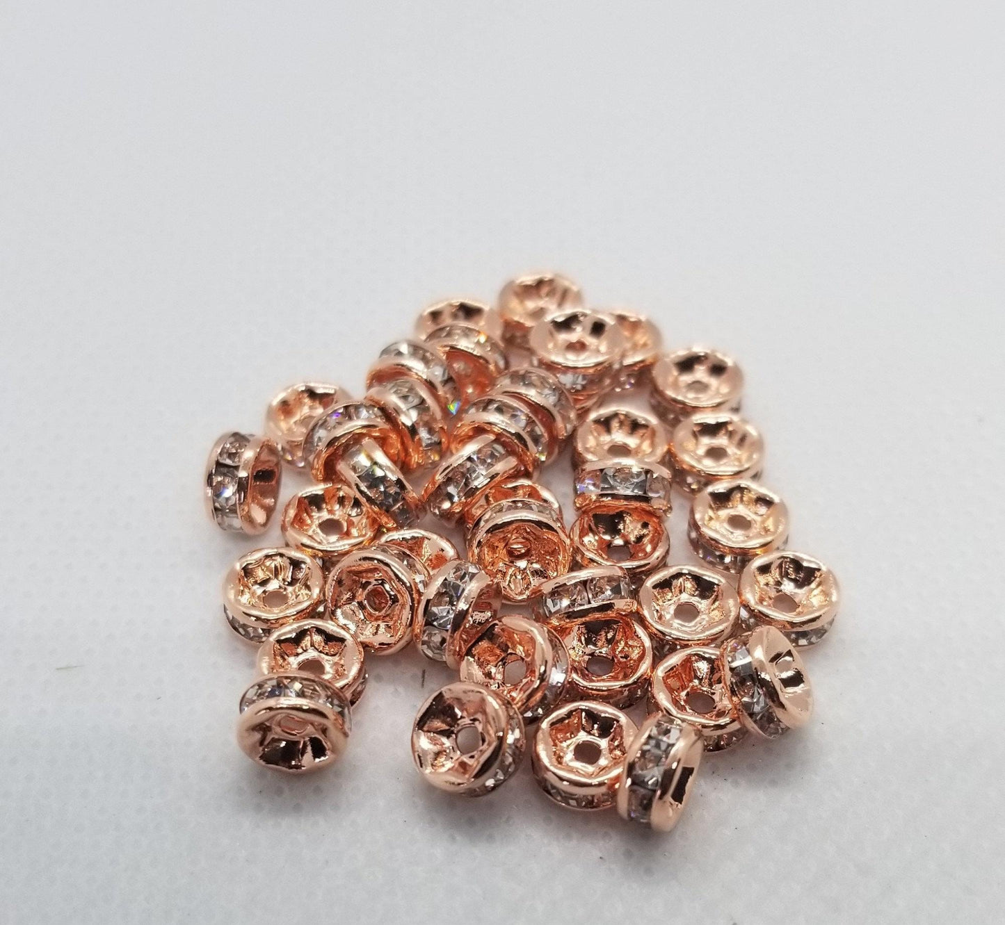 10 pieces Rose Gold Rhinestone Spacers, Grade AAA, Straight Flange, Nickel Free, Rondelle, Clear Crystal, 6x3mm, Hole: 1mm