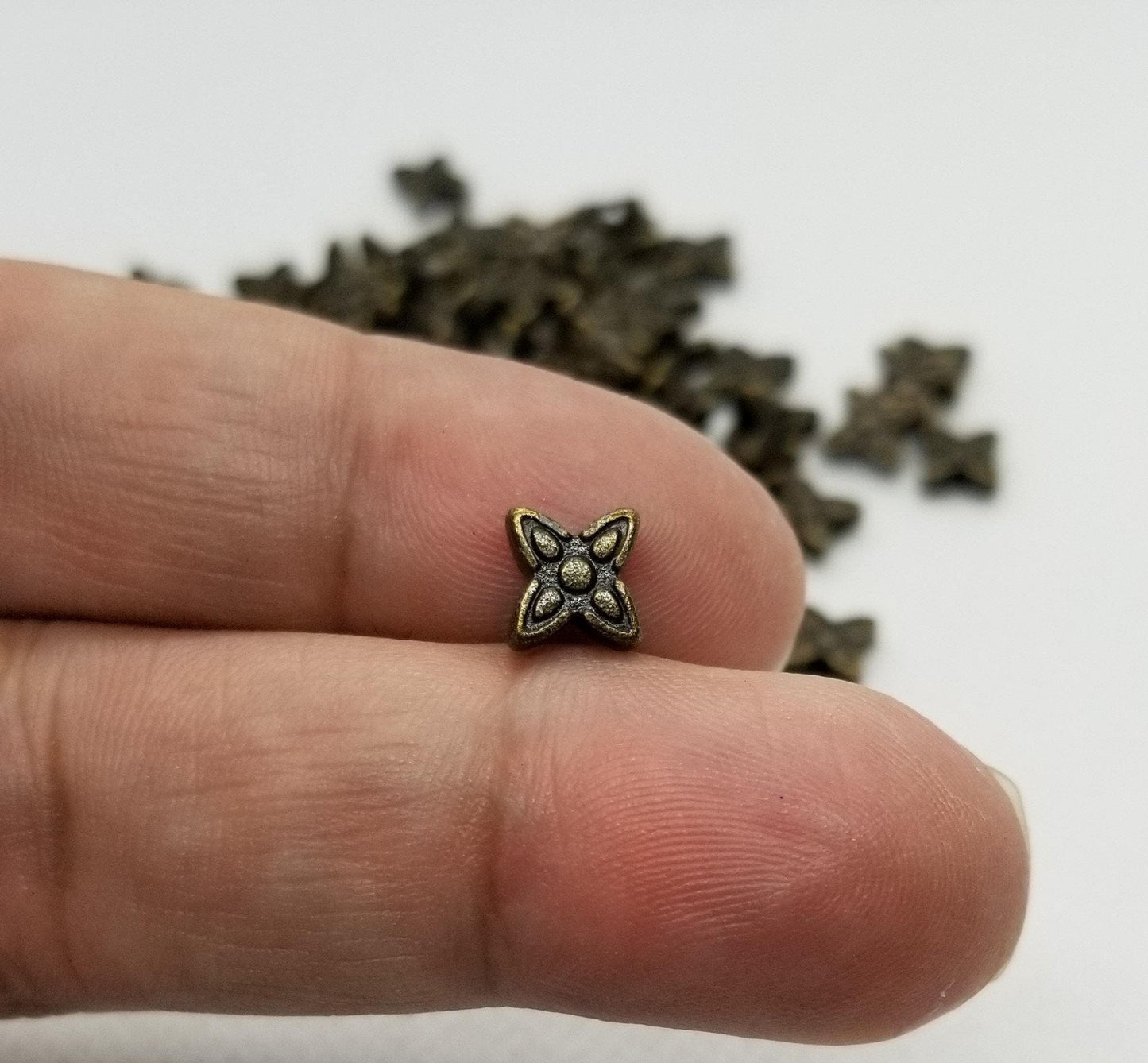 25 pieces Bronze Star Spacer Bead Tibetan Style, Lead, Nickel, Cadmium Free, Flower, Antique Bronze Color, 7x6.5x2.5mm, hole 1mm