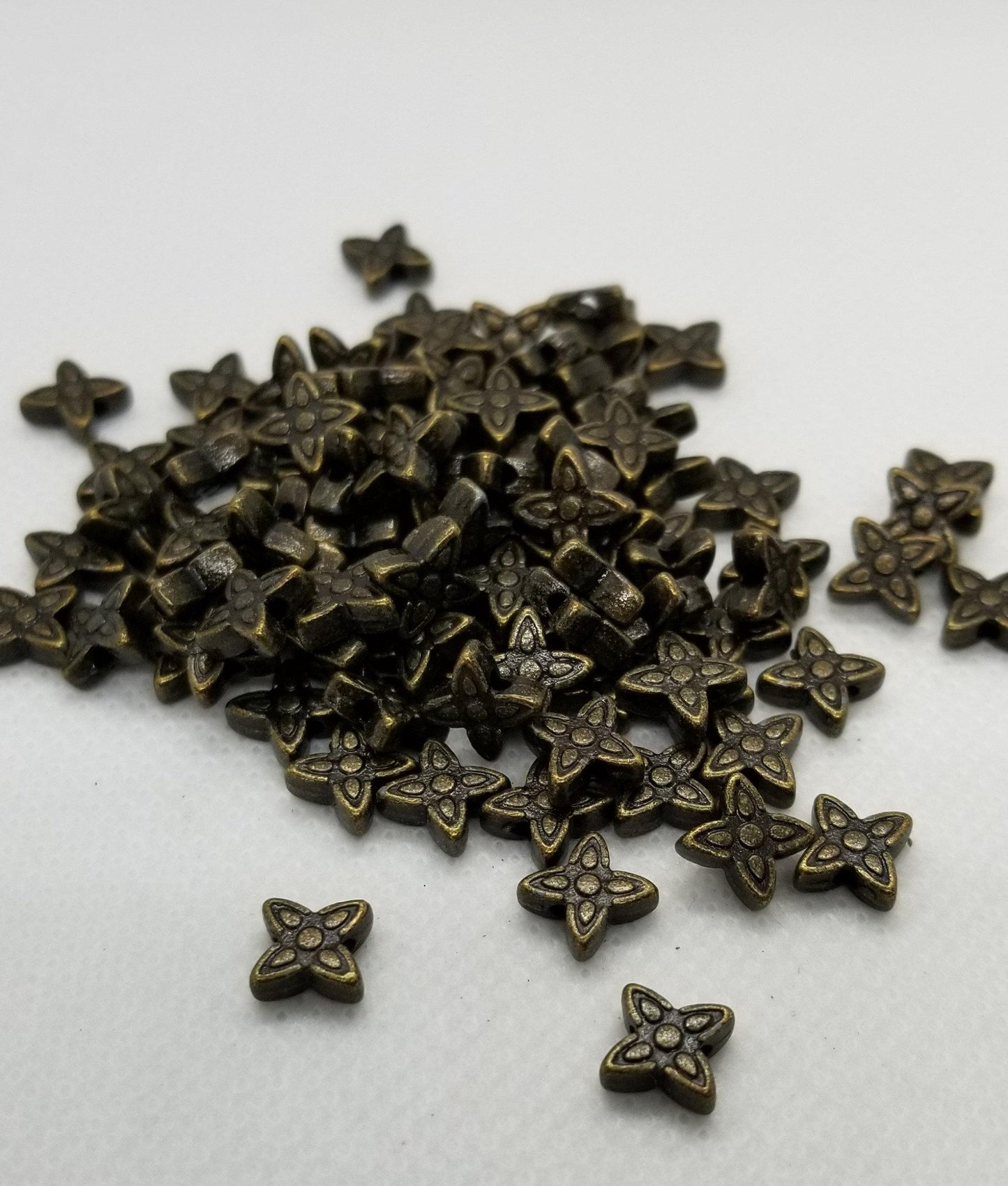 25 pieces Bronze Star Spacer Bead Tibetan Style, Lead, Nickel, Cadmium Free, Flower, Antique Bronze Color, 7x6.5x2.5mm, hole 1mm