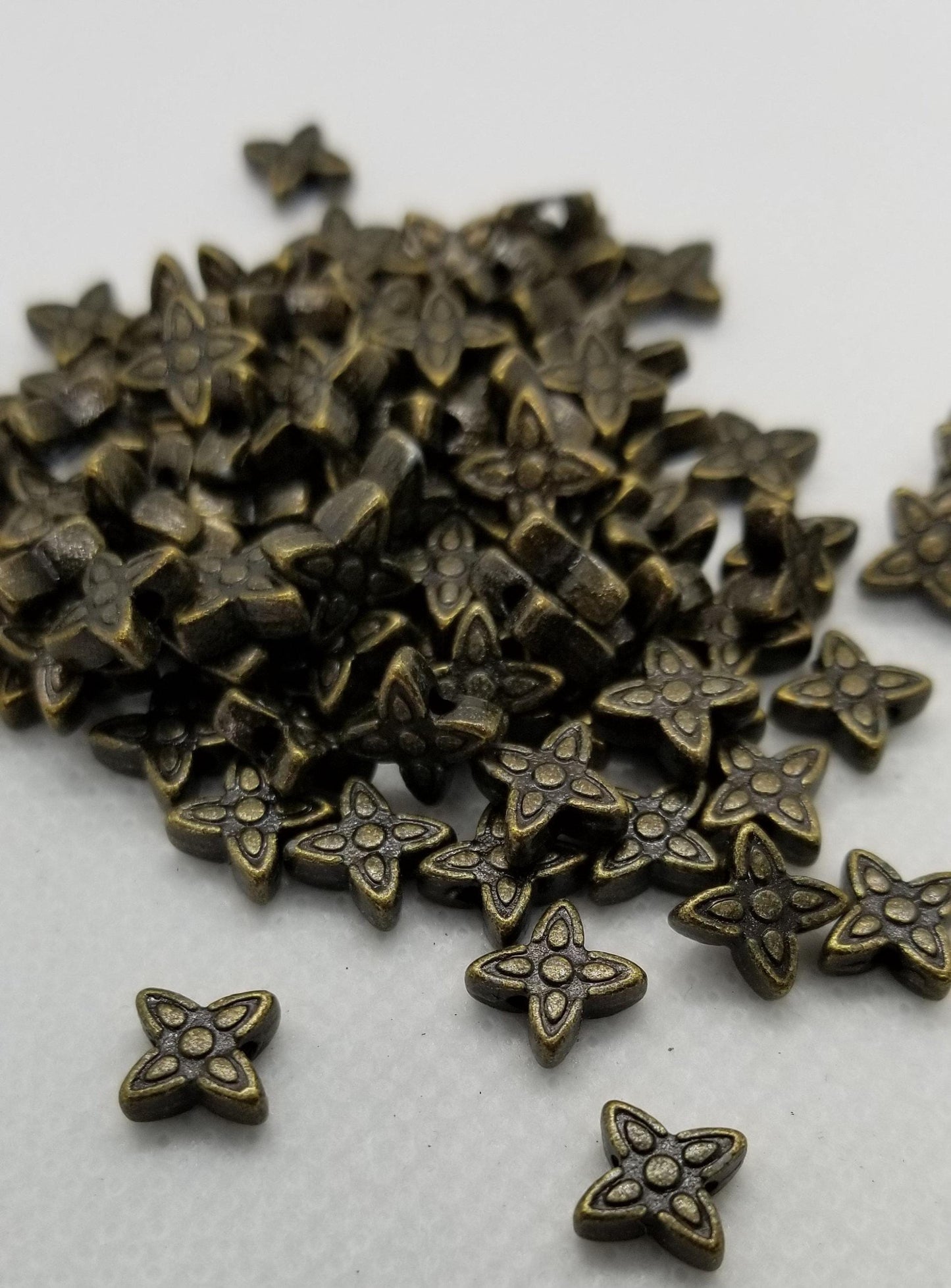 25 pieces Bronze Star Spacer Bead Tibetan Style, Lead, Nickel, Cadmium Free, Flower, Antique Bronze Color, 7x6.5x2.5mm, hole 1mm
