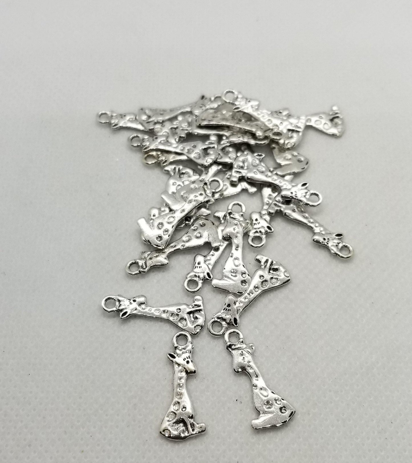 10 pieces Silver Giraffe Charms, Adorable Pendants, Cadmium & Lead Free, Sitting Giraffe, Antique Silver, 22x8x1mm, Hole 2mm