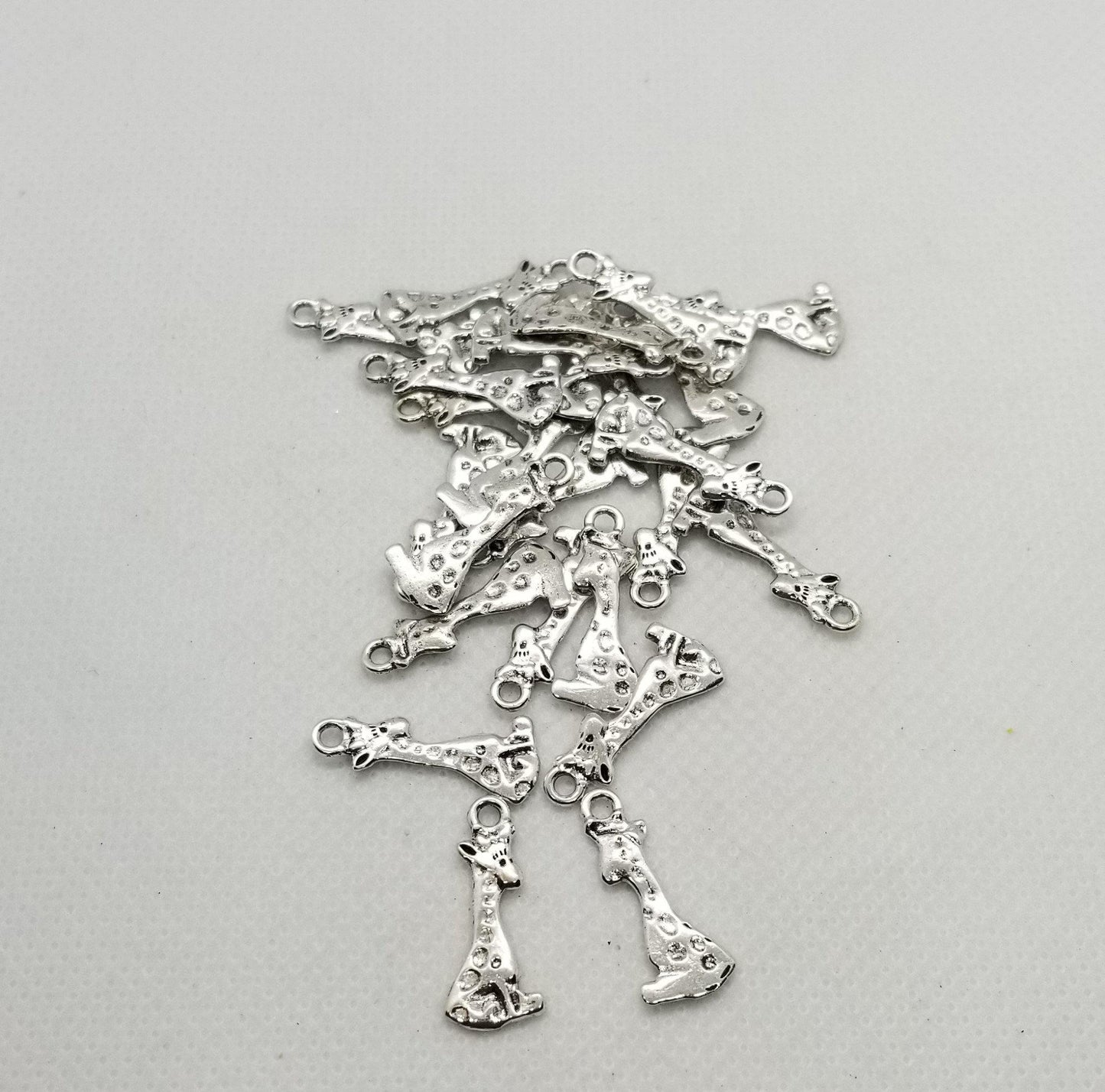 10 pieces Silver Giraffe Charms, Adorable Pendants, Cadmium & Lead Free, Sitting Giraffe, Antique Silver, 22x8x1mm, Hole 2mm