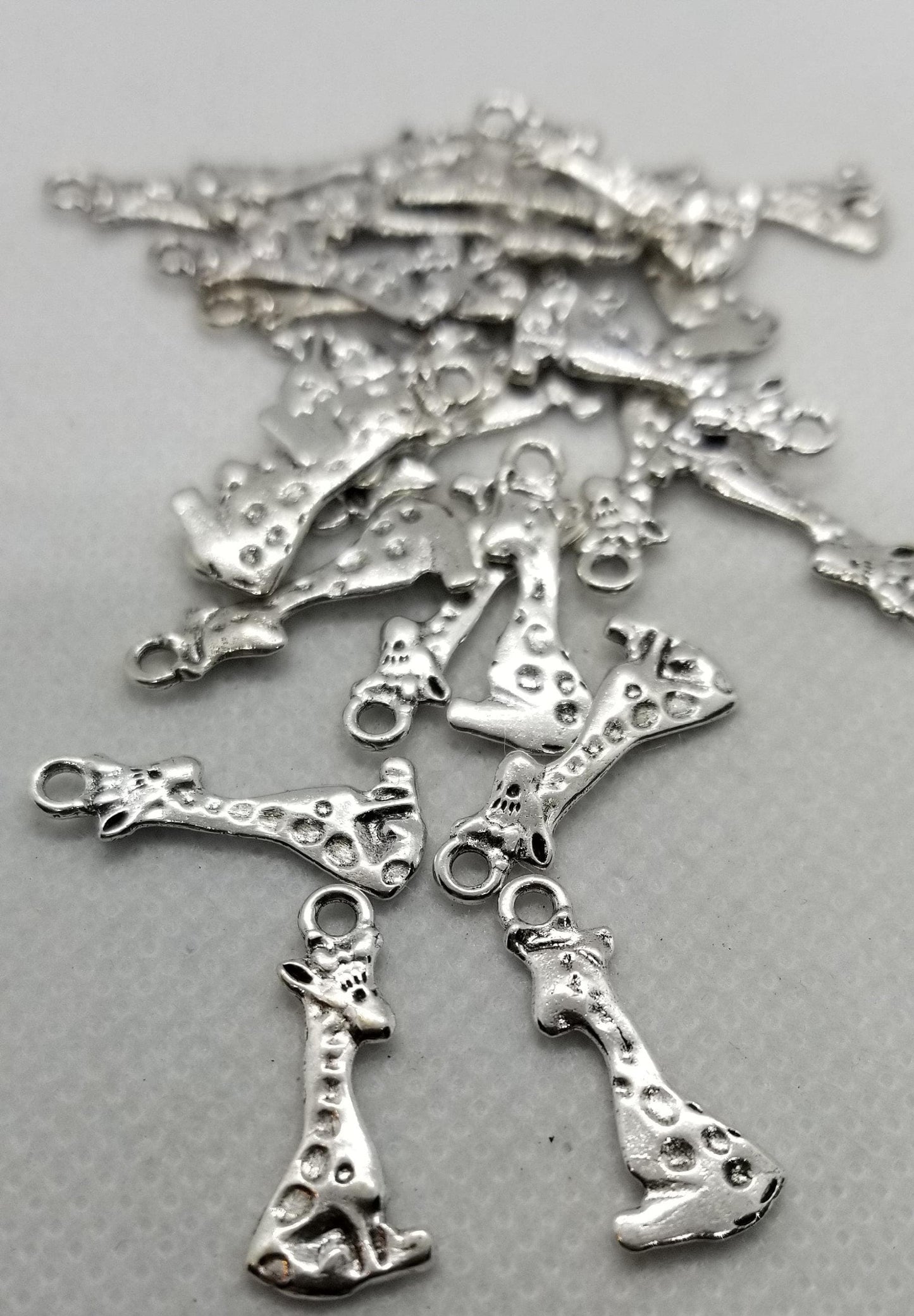 10 pieces Silver Giraffe Charms, Adorable Pendants, Cadmium & Lead Free, Sitting Giraffe, Antique Silver, 22x8x1mm, Hole 2mm