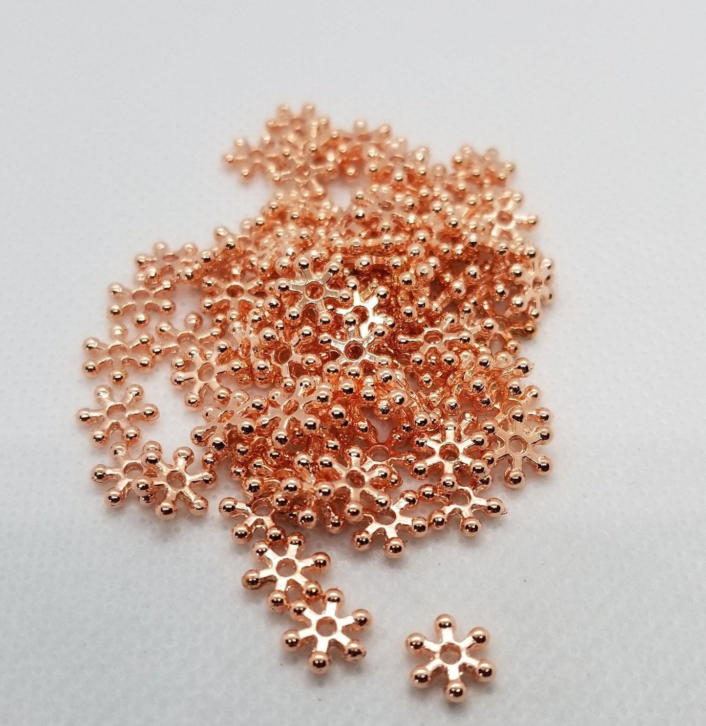 40 pieces Rose Gold Daisy Spacer Beads, Flower, Star, Lead Free, Cadmium Free, Brass Alloy, Rose Gold colour, 7x2mm, Hole 1.5mm
