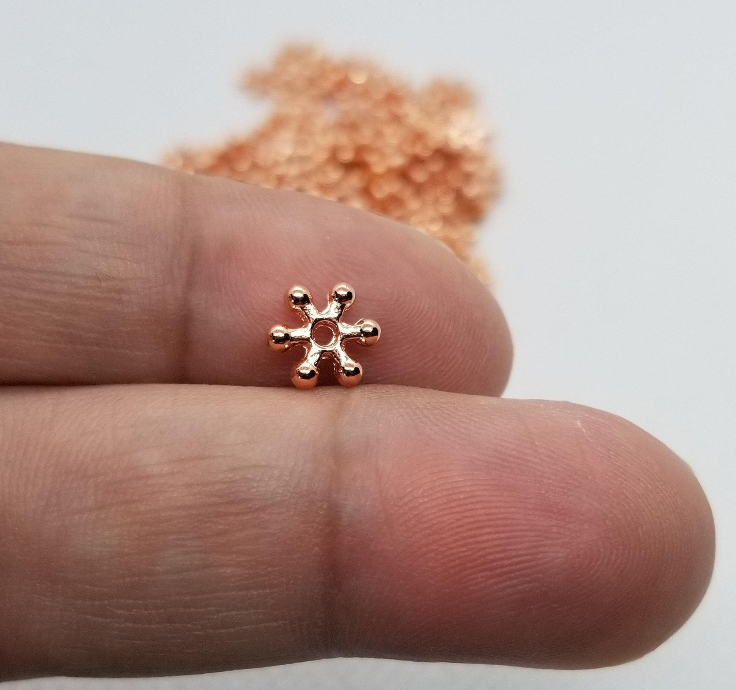 40 pieces Rose Gold Daisy Spacer Beads, Flower, Star, Lead Free, Cadmium Free, Brass Alloy, Rose Gold colour, 7x2mm, Hole 1.5mm