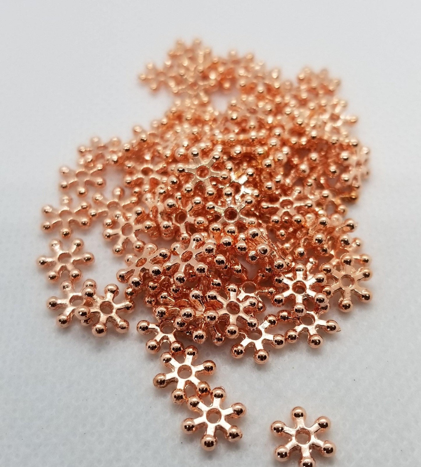 40 pieces Rose Gold Daisy Spacer Beads, Flower, Star, Lead Free, Cadmium Free, Brass Alloy, Rose Gold colour, 7x2mm, Hole 1.5mm