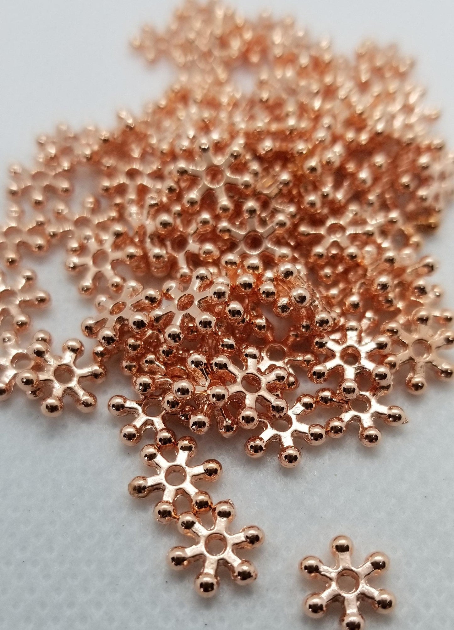 40 pieces Rose Gold Daisy Spacer Beads, Flower, Star, Lead Free, Cadmium Free, Brass Alloy, Rose Gold colour, 7x2mm, Hole 1.5mm