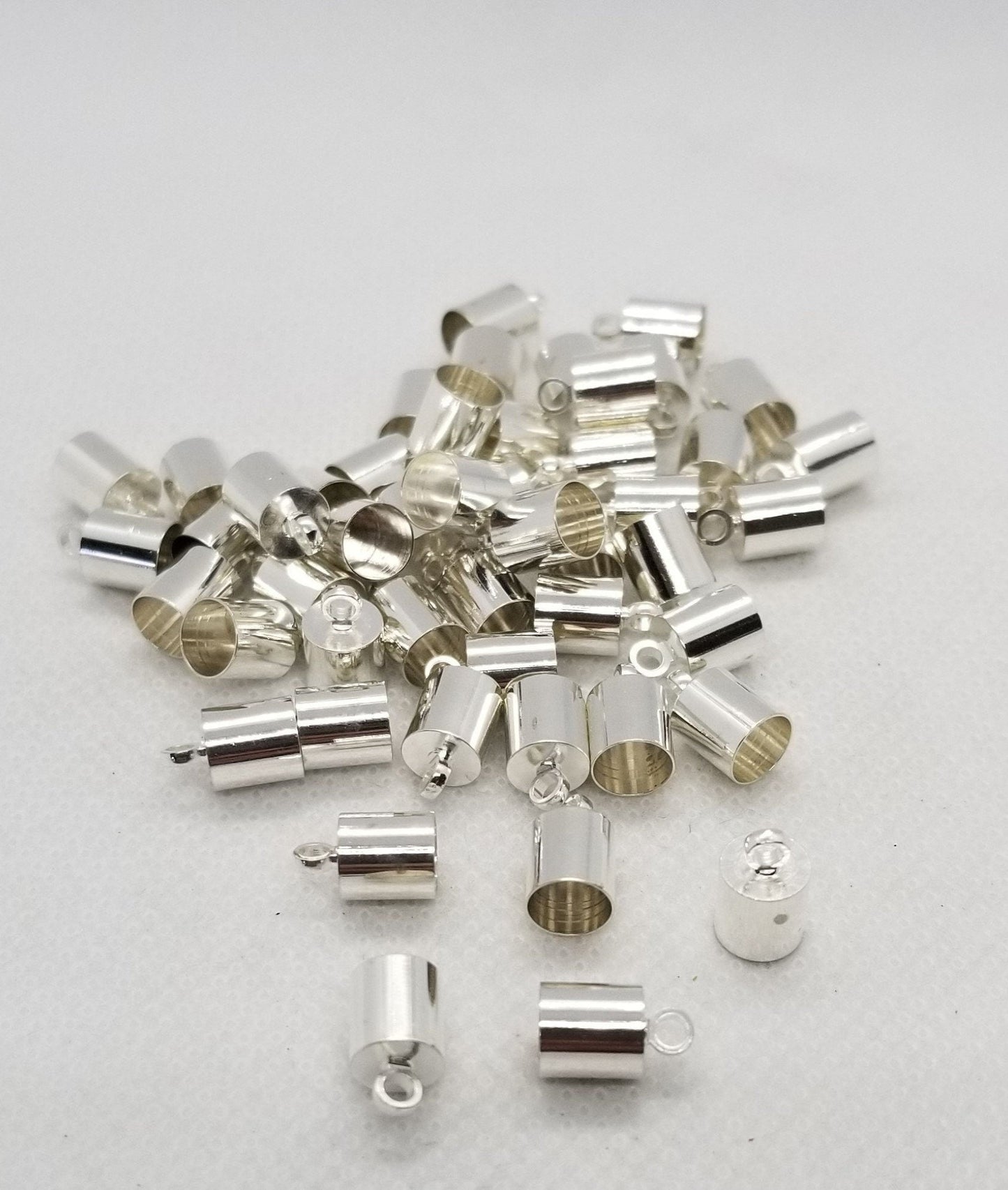 10 pieces Silver Cord Ends, Brass, Nickel Free, Silver Colour Plated, 9.5x6mm, Hole 1.1mm, 5.5mm inner diameter