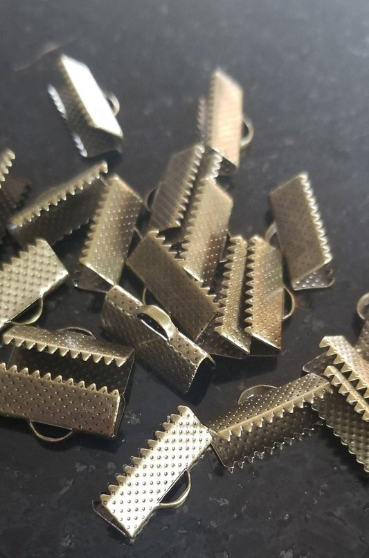 10 pieces Folding Ribbon Crimp Ends, Antique Bronze Color, about 16mm wide, 8mm long, 5mm thick, hole: 1-2 mm