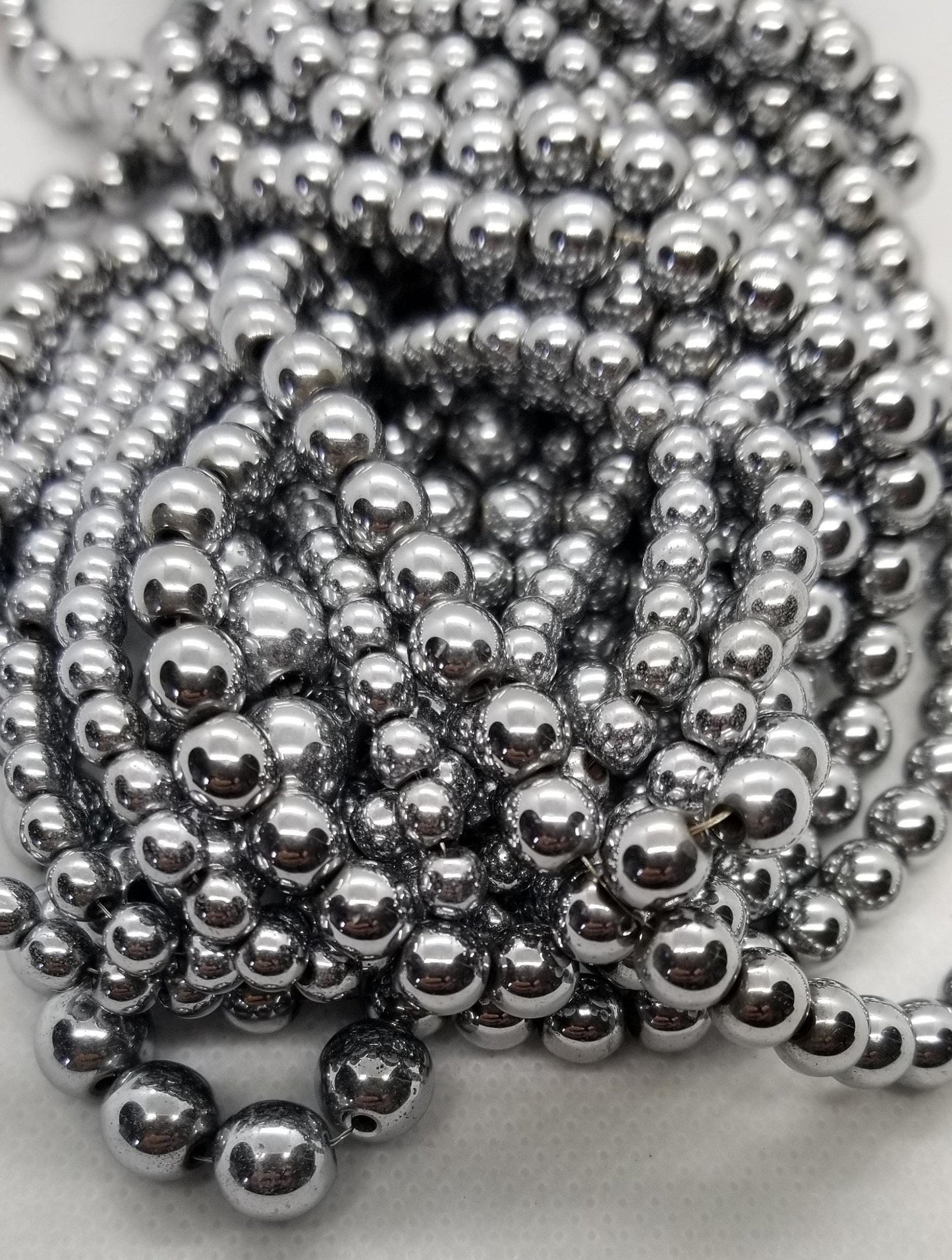 1 strand Round Platinum Hematite Spacer Beads, Grade A Non-magnetic Synthetic Plated, 4-6-8mm Hole 1mm, Full Strand bead count in desc