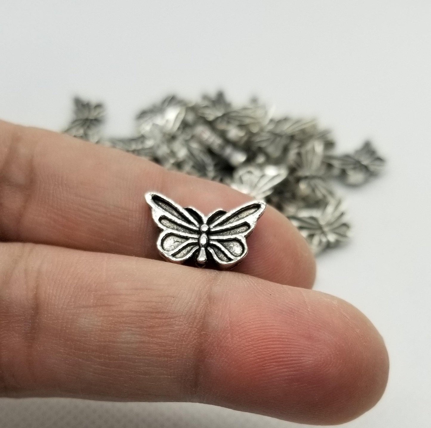 10 pieces Silver Butterfly Charm, Tibetan Style Alloy, Cadmium, Nickel, Lead Free, Antique Silver, 10x16.5x3mm,Hole 1mm, Hole Nose to Tail