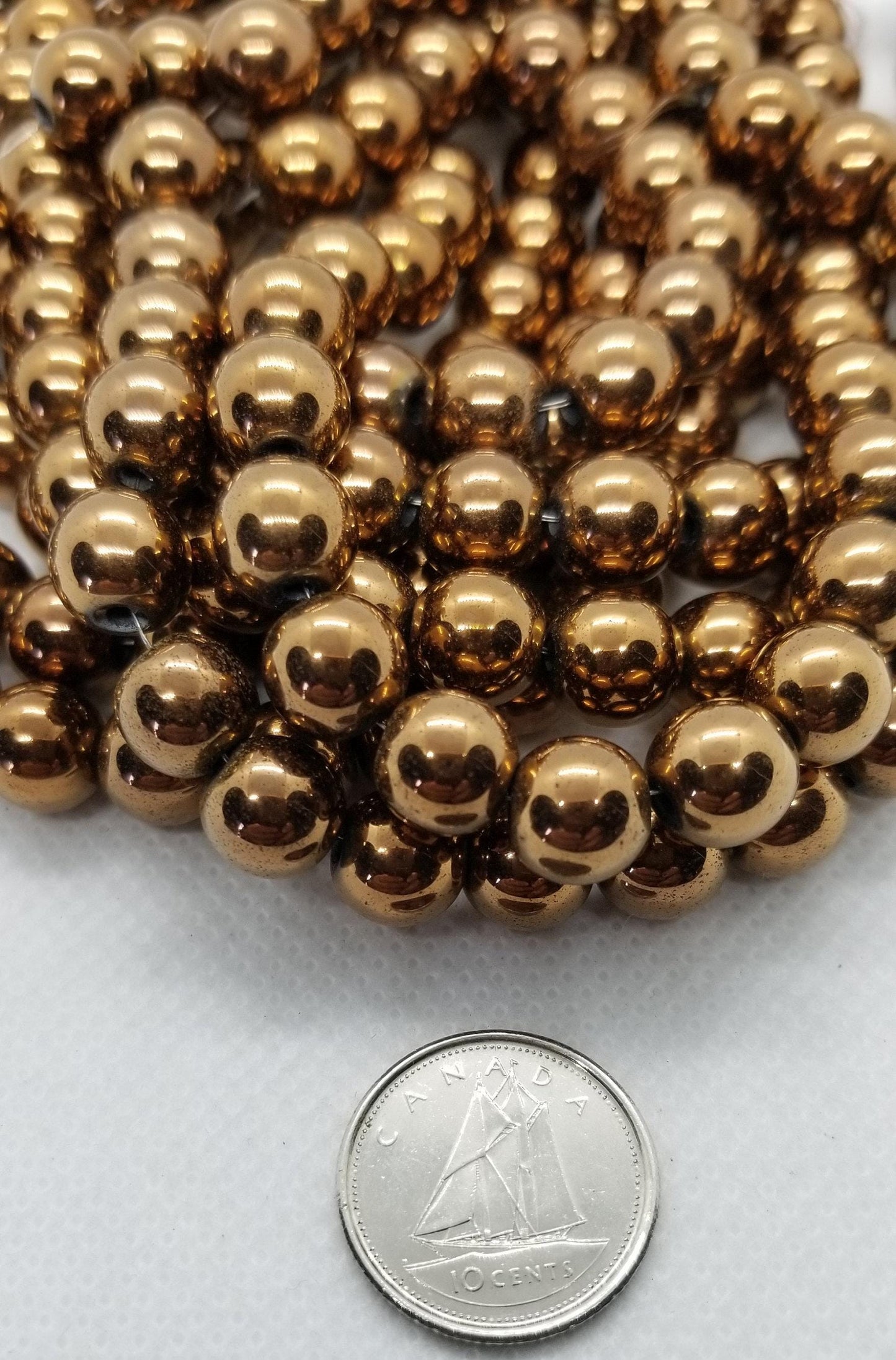 1 strand Round Copper Hematite Beads, Grade A, Non-magnetic Synthetic, Copper colour Plated, 6-8mm Hole 1mm, Full Strand, bead count in desc